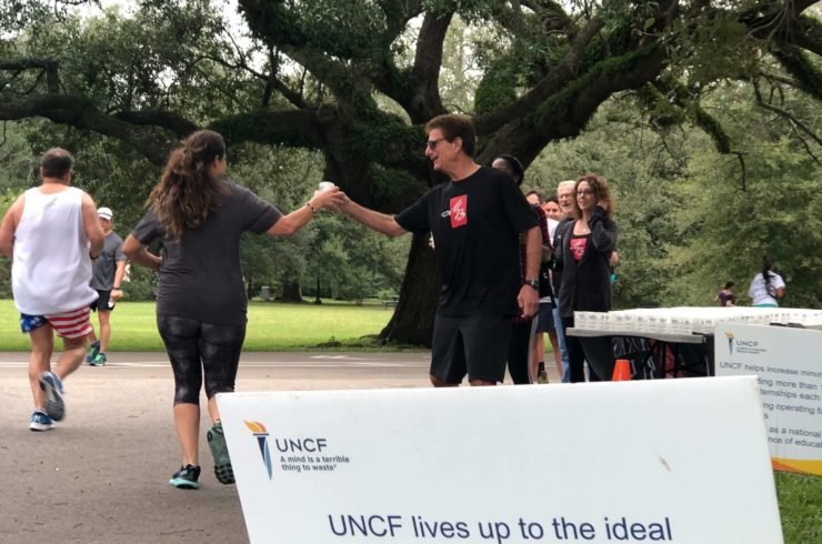 morris bart handing out water at the UNCF walk for education 2019