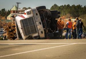 overturned logging truck