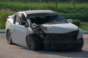 wrecked silver car