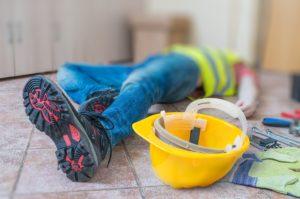 injured worker lying on the floor