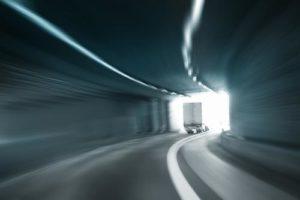 Truck going through a tunnel.