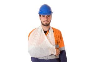 injured worker with his arm in a cast