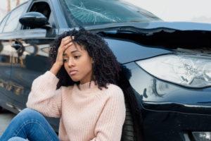 woman feels disoriented after a collision