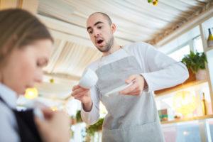 negligent waiter spills hot coffee on patron