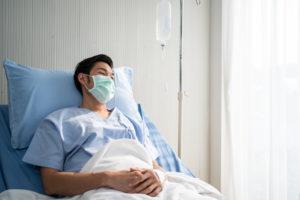 A patient recovers from his injuries in the hospital.