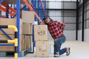 warehouse worker with back pain